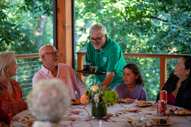 Wolf Trap volunteer Mike serves at a member dinner event.