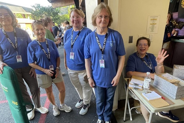 Wolf Trap Volunteer Chris Temple working at the Wolf Trap Gift Shop.