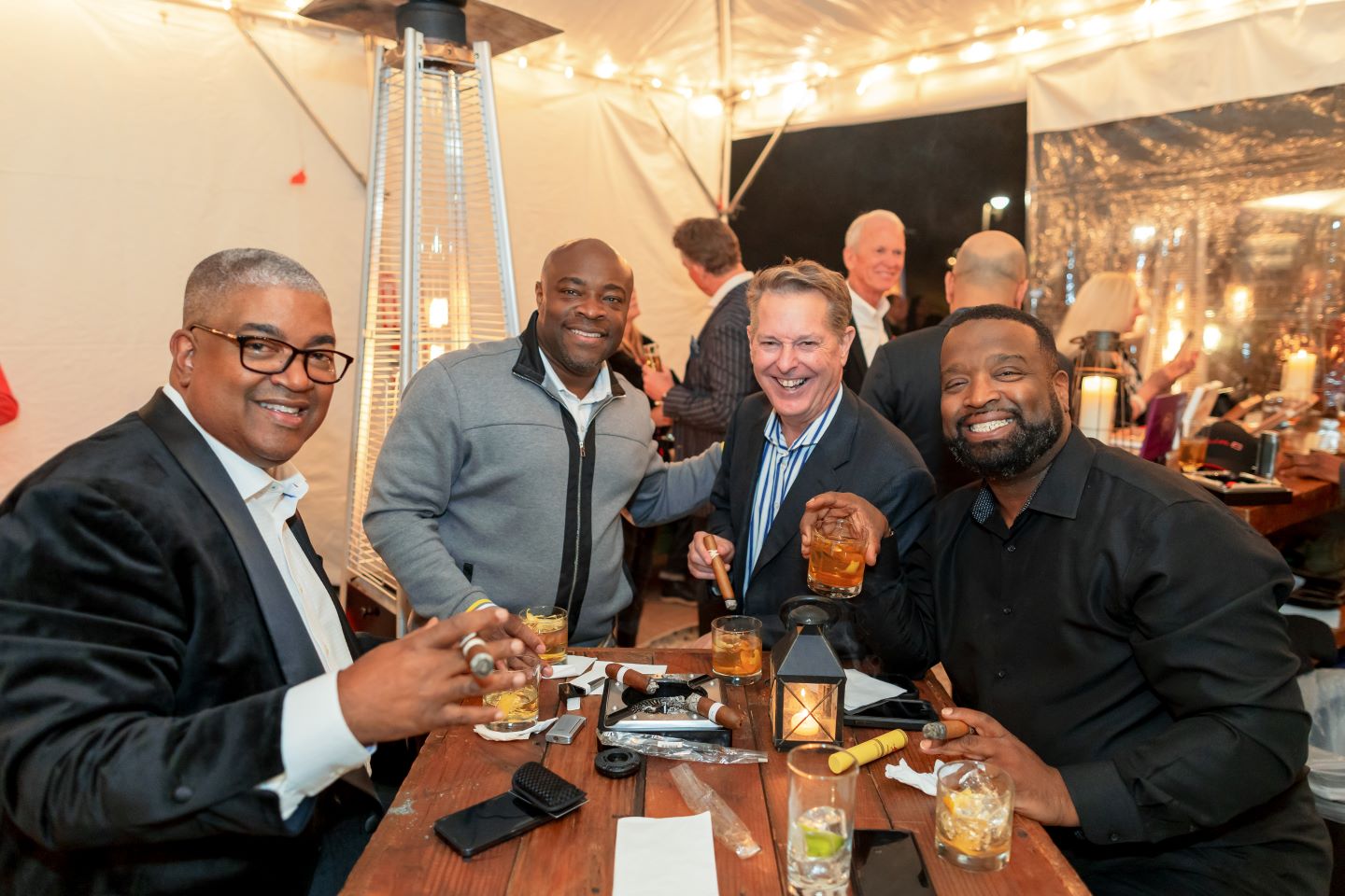 A group of guests drink bourbon at a Wolf Trap event.