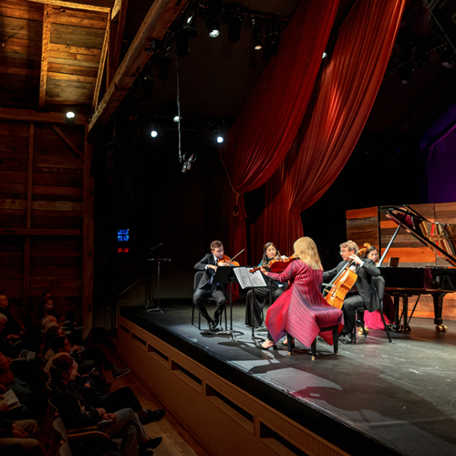 String quartet plays on stage at the Barns.