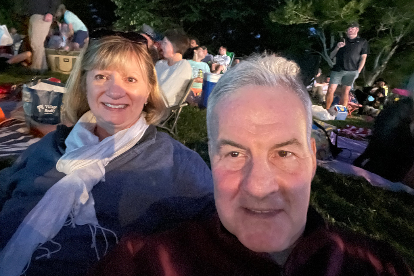 Stacy and Jim Riordan posing on the Wolf Trap lawn.