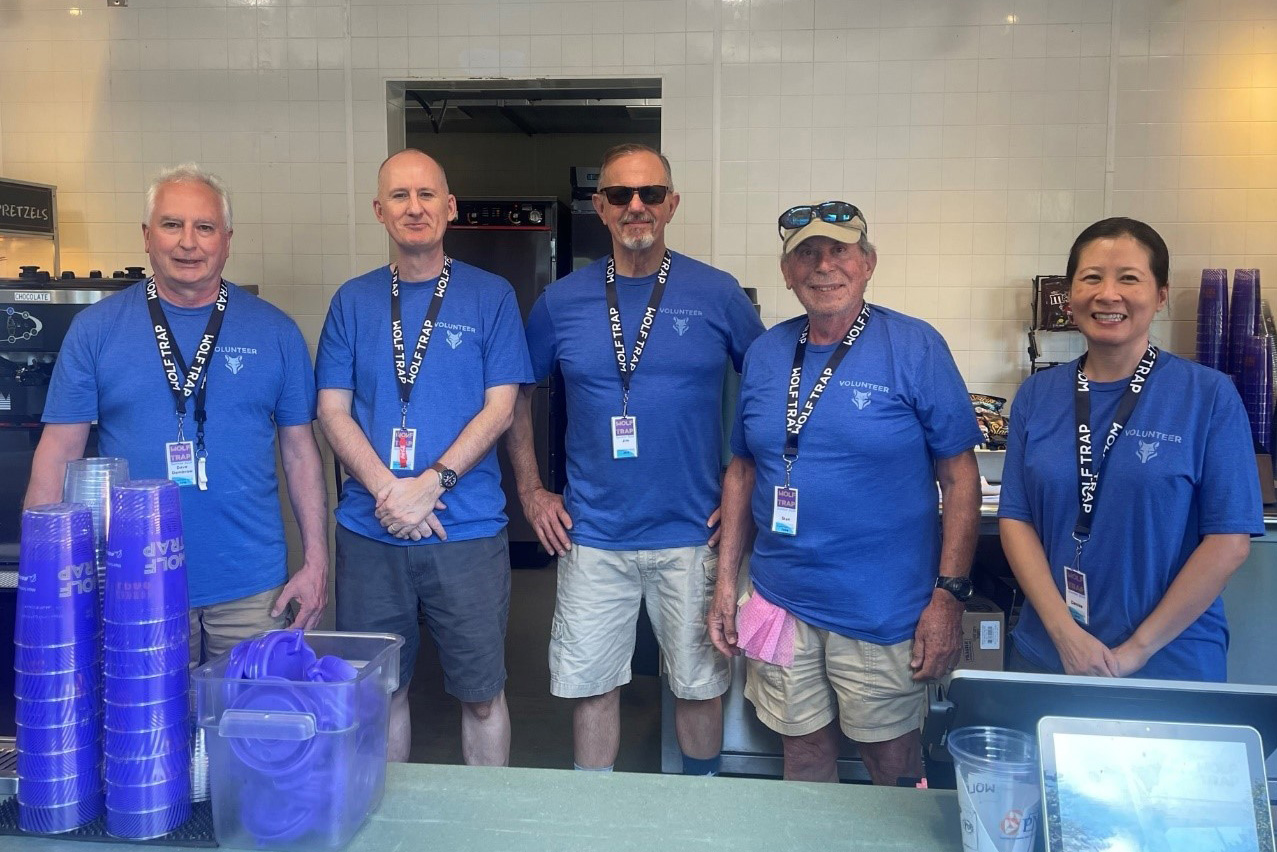 Volunteers pose in the concessions stand.