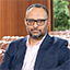 Arvind Manocha seated in the Filene Center.