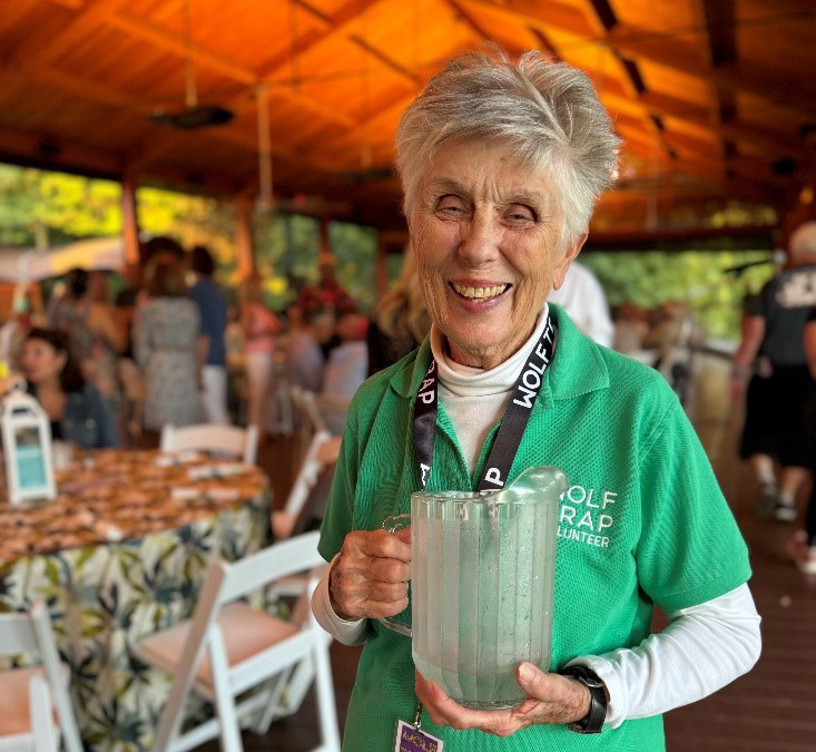 Wolf Trap Volunteer Bette Gorman serves at a wolf trap member event at the Associates Pavilion.