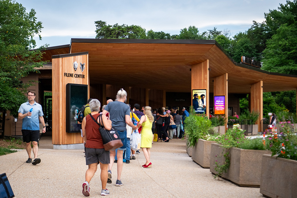 Concert patrons walk up to Wolf Trap's new main gate.